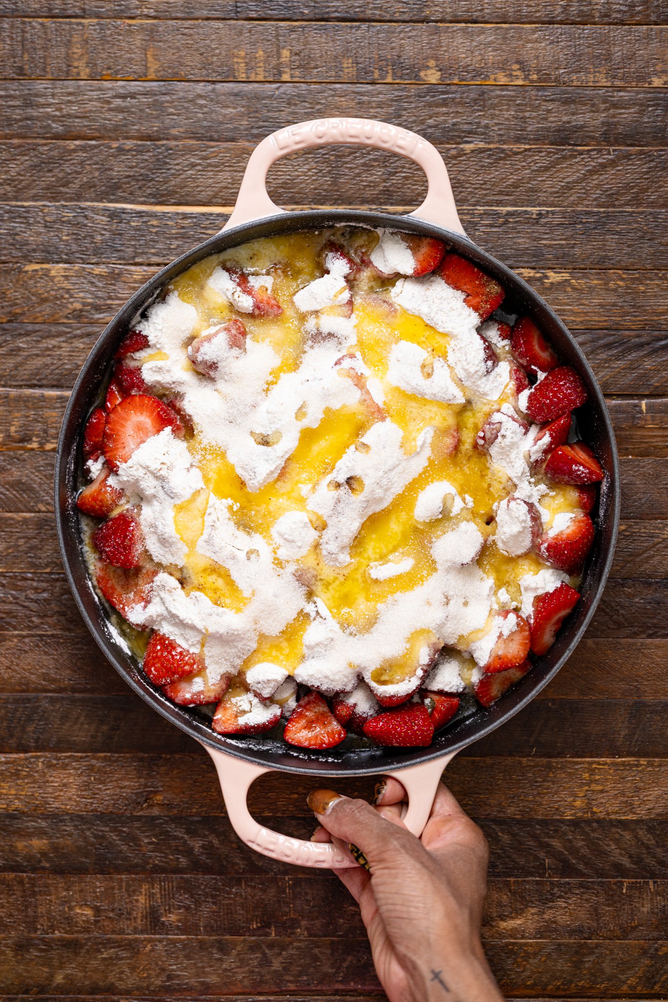 Southern Strawberry Dump Cake assembled in round deep skillet.