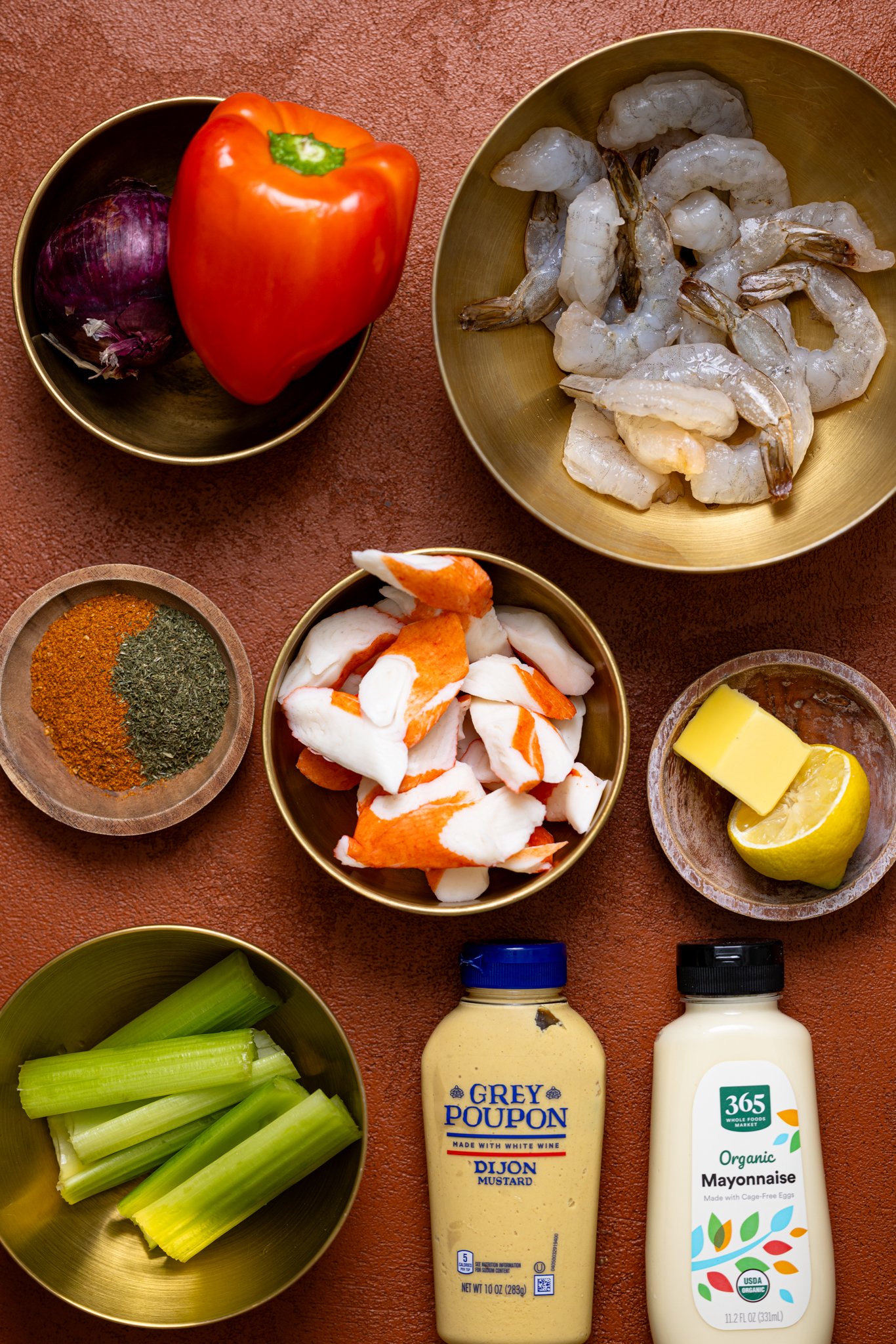 Ingredients on a burnt orange table.