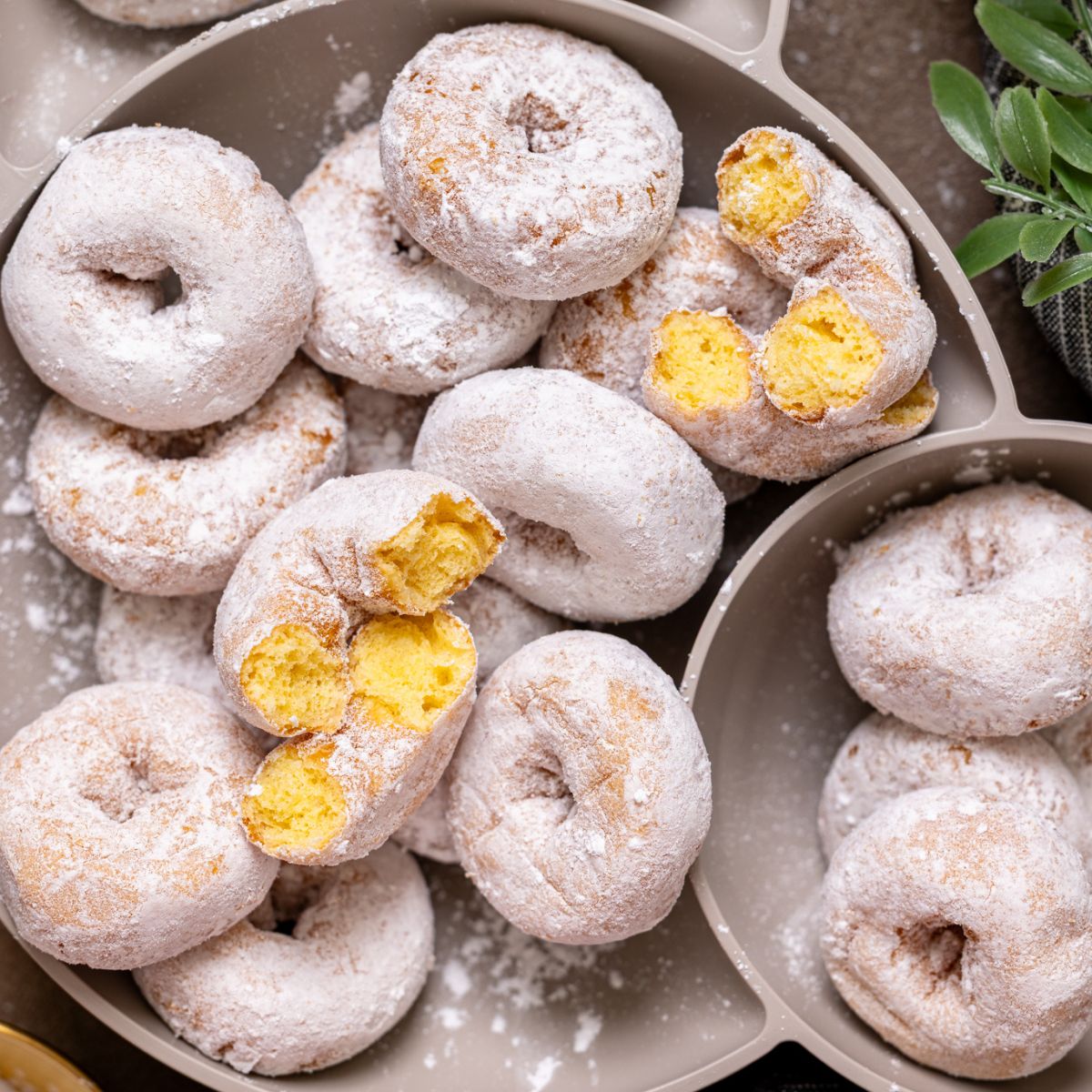 Up close shot of Homemade Mini Powdered Sugar Donuts.