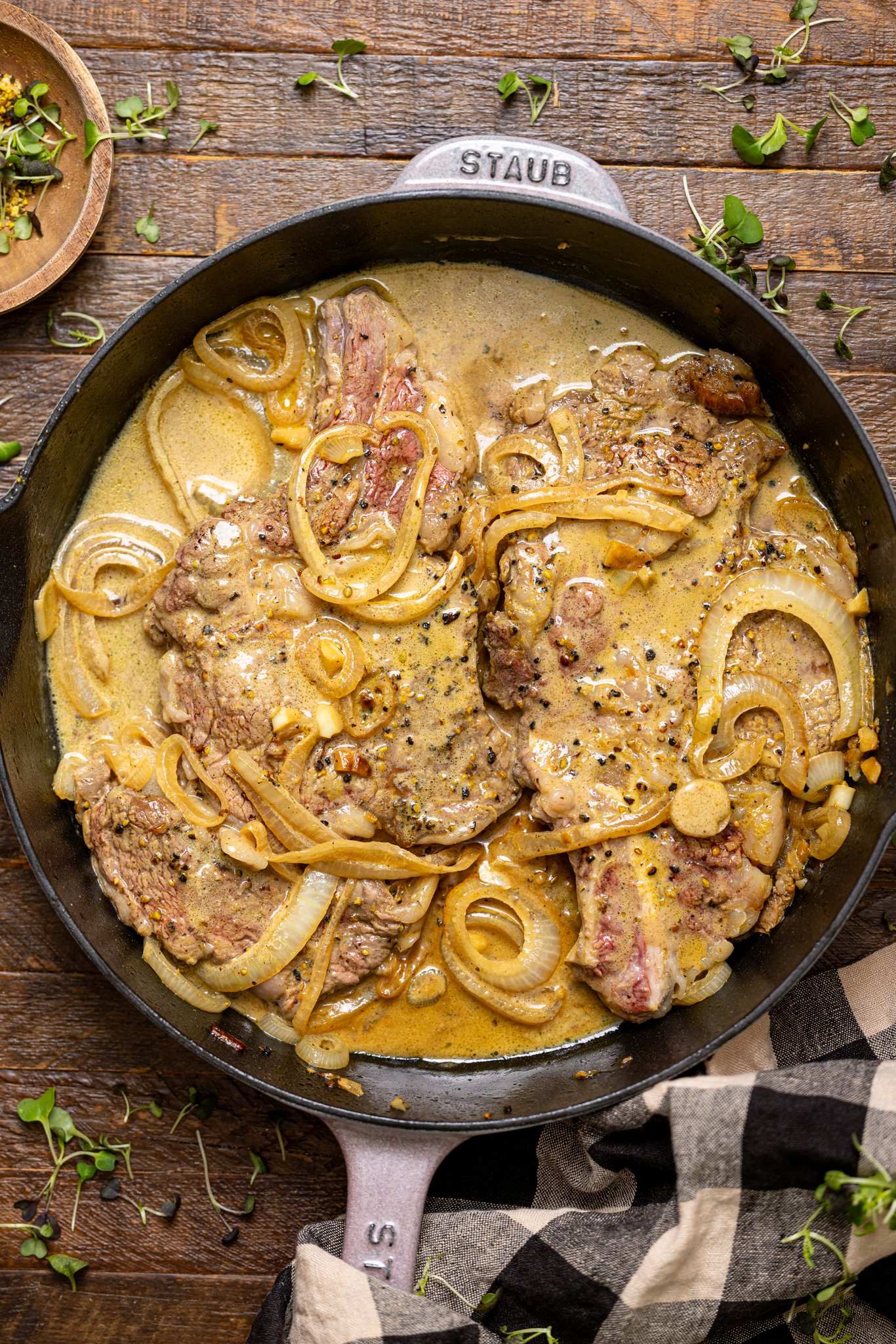 The Best Southern Smothered Steak in a skillet.