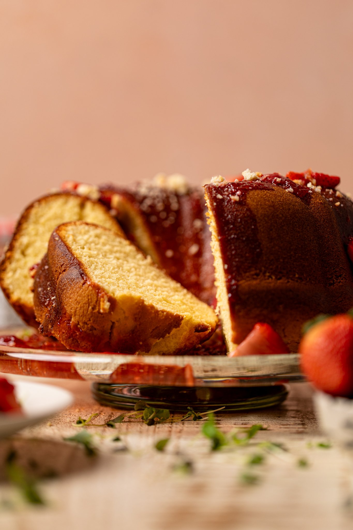 Straight shot of Strawberry Shortcake Bundt Cake sliced.