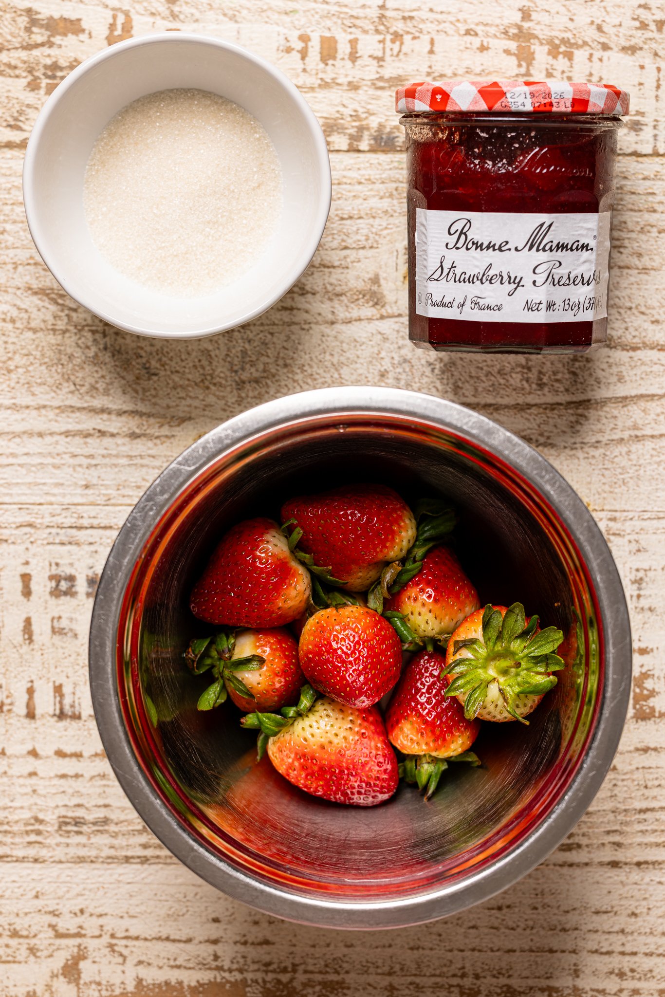 Glaze ingredients on a white wood table.
