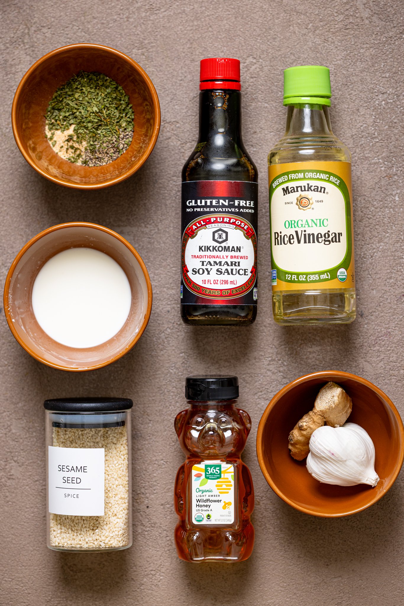 Ingredients on a grey-brownish table.