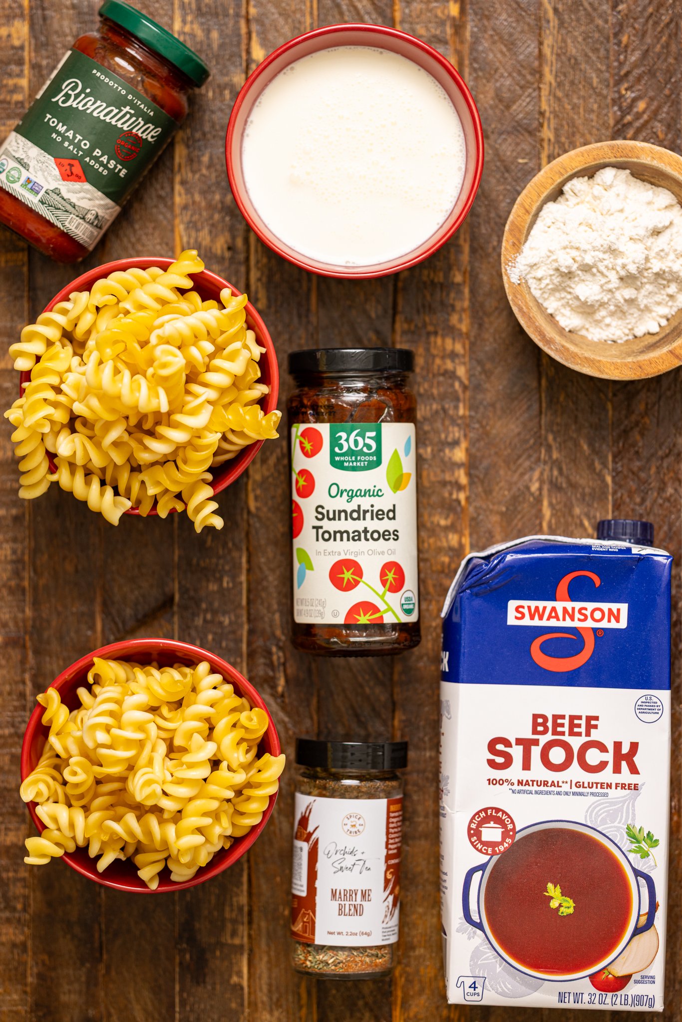 Ingredients on a brown wooden table.