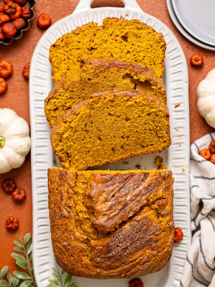 Comforting Pumpkin Chai Latte Bread sliced on a platter.