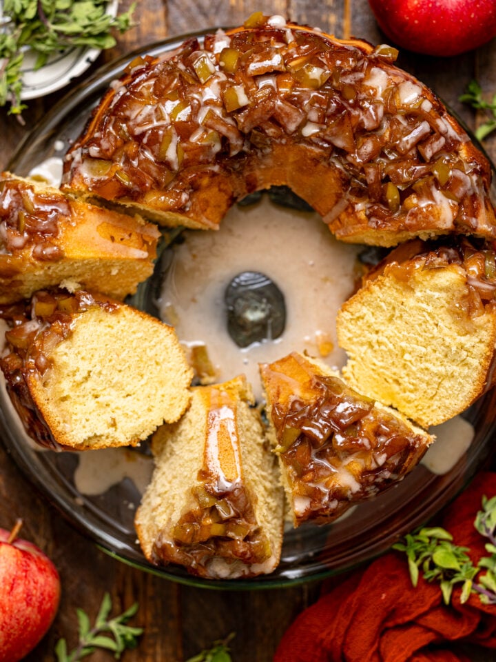 The Best Apple Pie Bundt Cake sliced with apples.