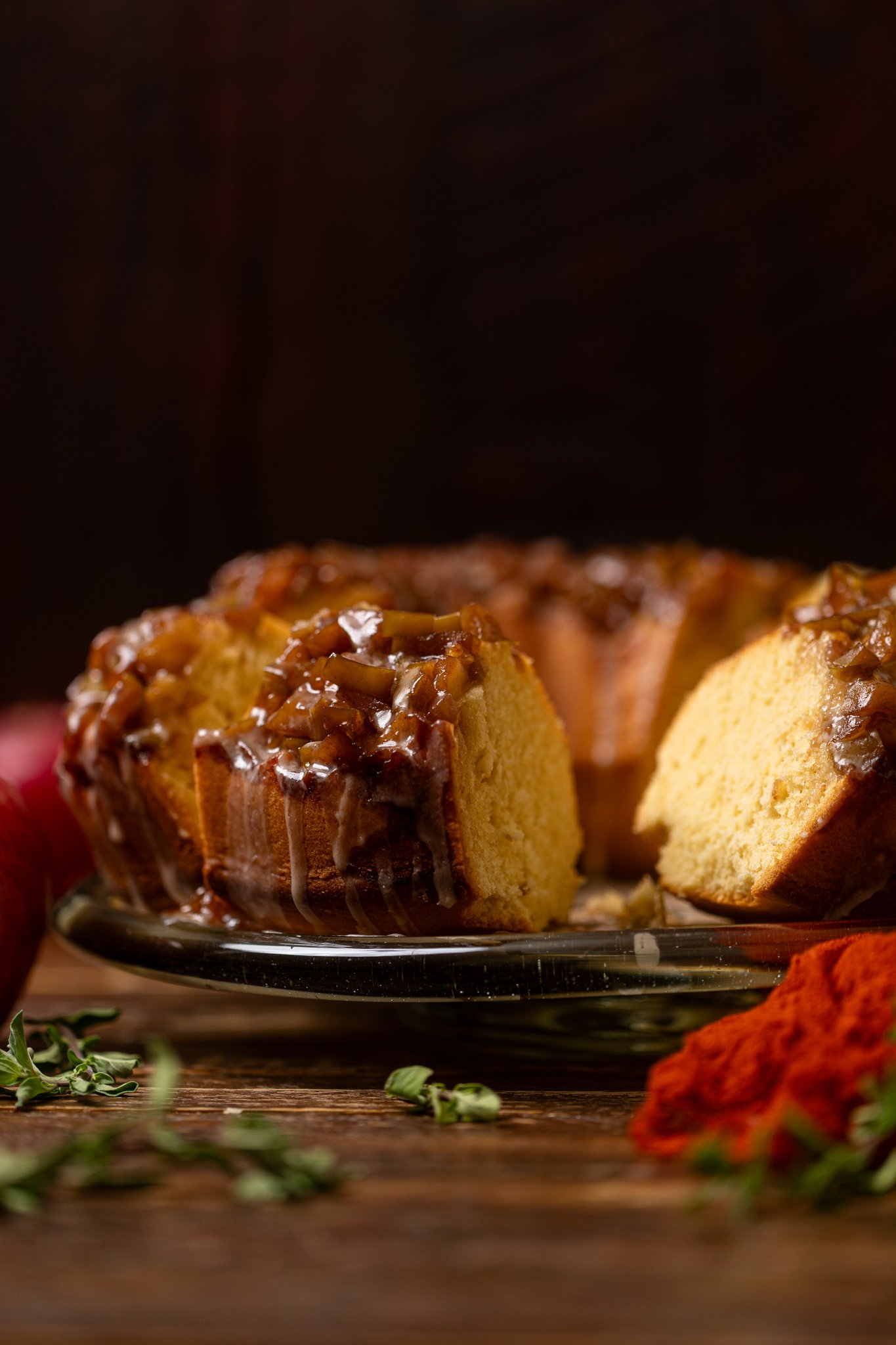 The forward shot of The Best Apple Pie Bundt Cake on a cake stand.